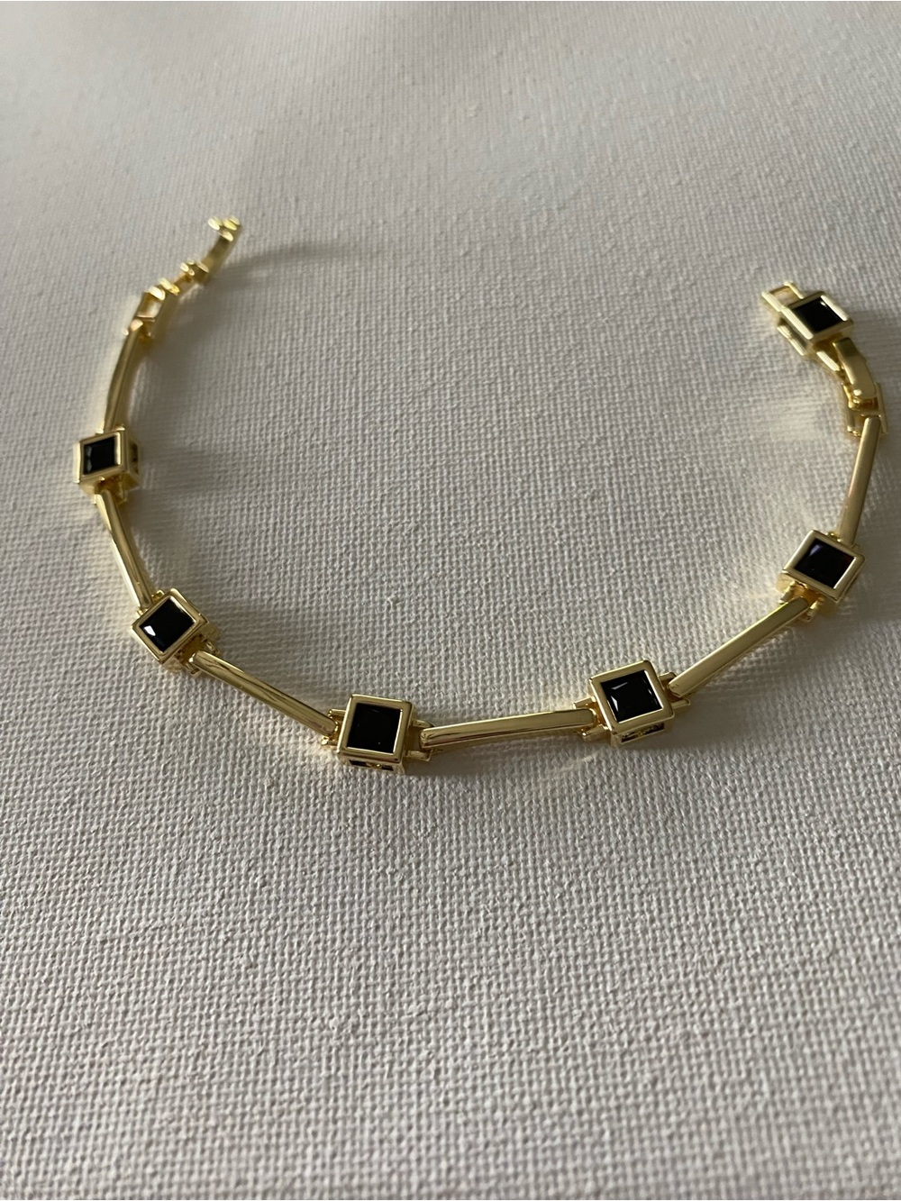 Gold-tone Bracelet with Black Square Gemstones
